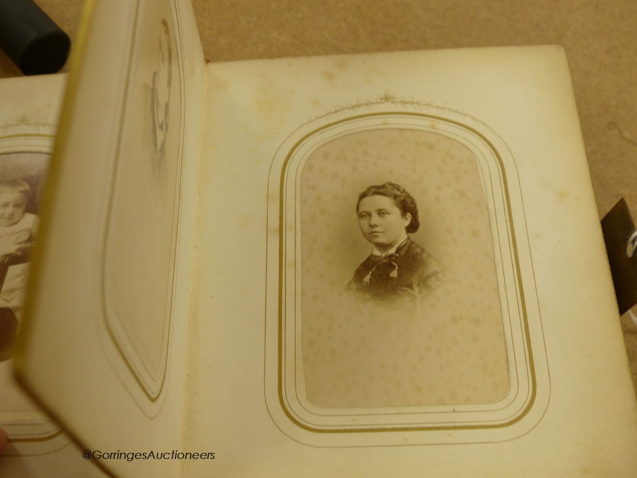 A silver mounted leather writing case, box, a photograph album and Ambrotype.